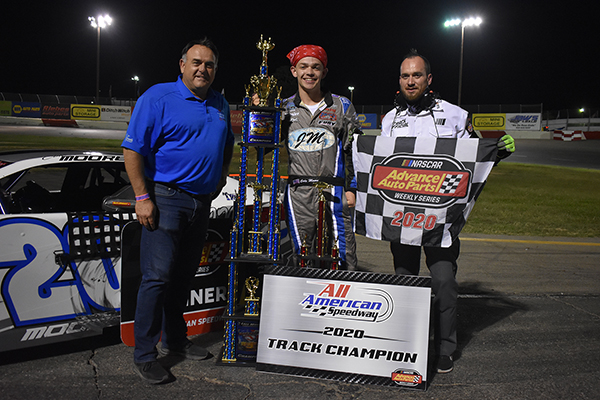 NASCAR Late Model Champion Cole Moore in action, embodying the spirit of competition at All American Speedway.